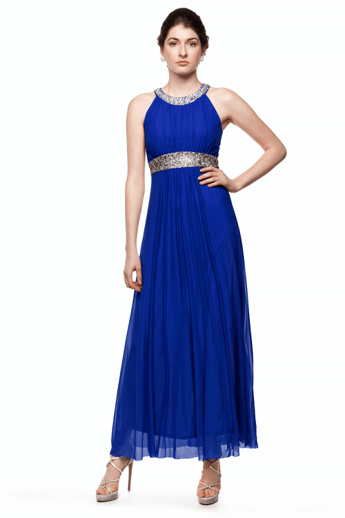 Woman wearing a blue evening gown with a silver belt on a white background