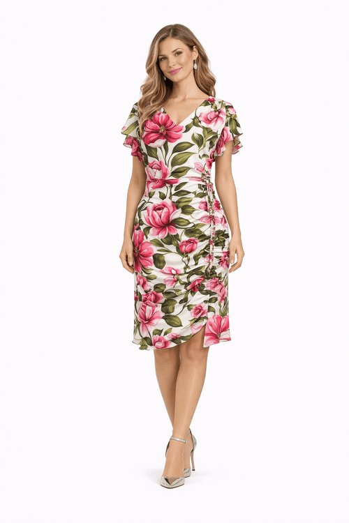 Woman wearing a floral dress on a white background