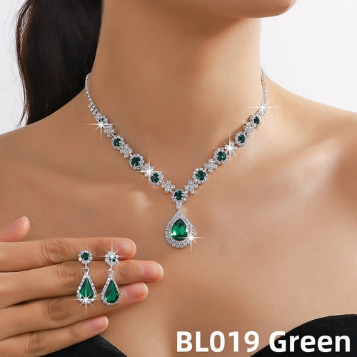 Green gemstone necklace and earrings on a mannequin with 'BL019 Green' text.