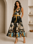 Woman wearing a sleeveless dress with abstract pattern and belt in a neutral setting