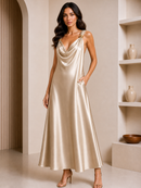 Woman wearing a white satin dress in an indoor setting