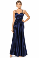 Woman wearing a navy blue evening gown on a white background