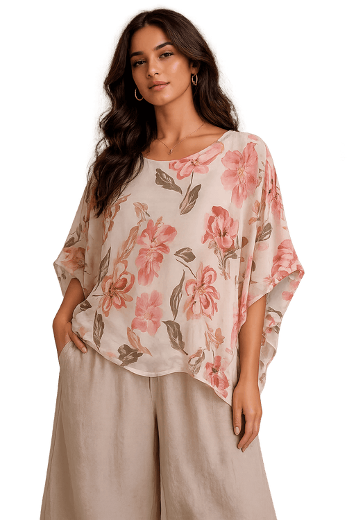 Woman wearing a floral blouse with a black background