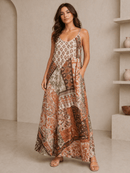Woman wearing a patterned dress in a minimalistic room.